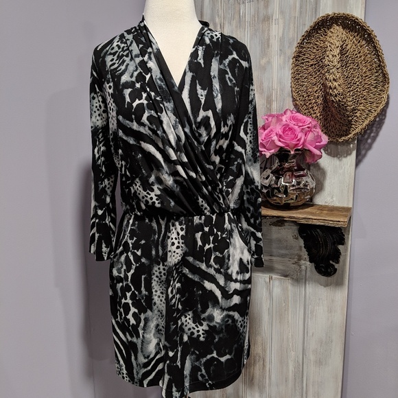 Chico's Dresses & Skirts - Chico's animal print, wrap top, 3/4 sleeve dress Chico's Dresses & Skirts - Chico's animal print, wrap top, 3/4 sleeve dress